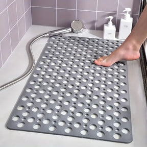 Tapete de Banheiro Antiderrapante com Ventosas – Drenagem Rápida e Massagem